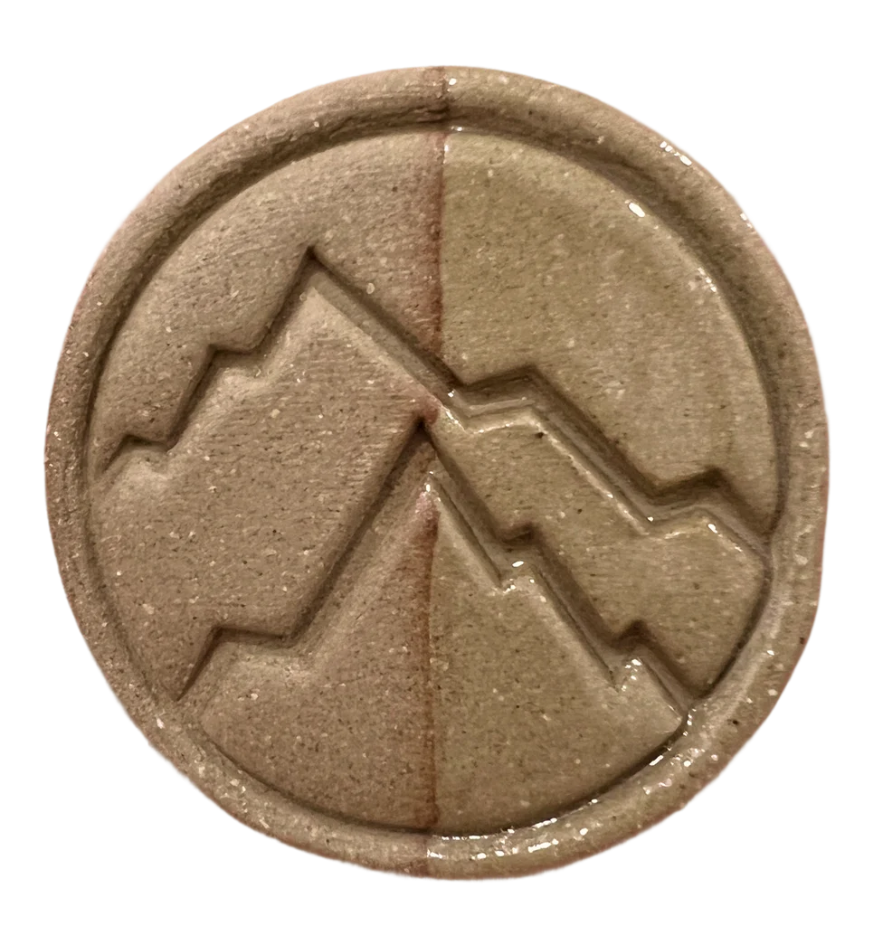 Kodiak test tile from Rocky Mountain Clay showing mocha oxidation finish