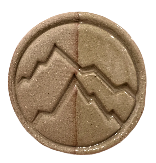 Kodiak test tile from Rocky Mountain Clay showing mocha oxidation finish